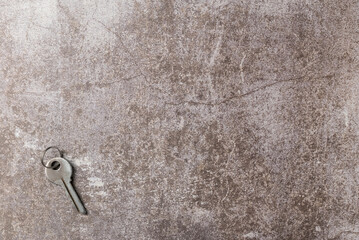 Collection of decorative aged keys on dark background. Flat lay, top view. Copy space