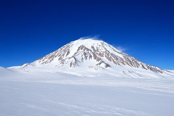 Fototapeta premium A frozen volcano with steam rising from cracks in the icy surface