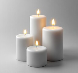 three white candles with one lit on the side