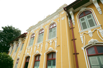 Obraz premium European window art of the yellow building, Chao Phraya Abhaibhubejhr building, Prachinburi