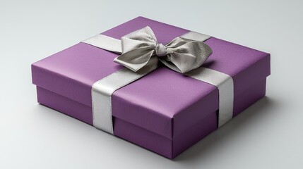 Obraz premium Elegant purple gift box with silver ribbon and bow, set against a minimalist background