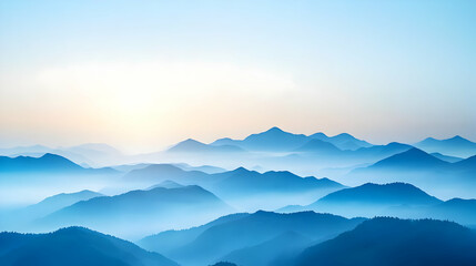 Fototapeta premium Panoramic Blue Mountain Range Landscape With Foggy Mist Under A Cloudy Sky at Sunrise