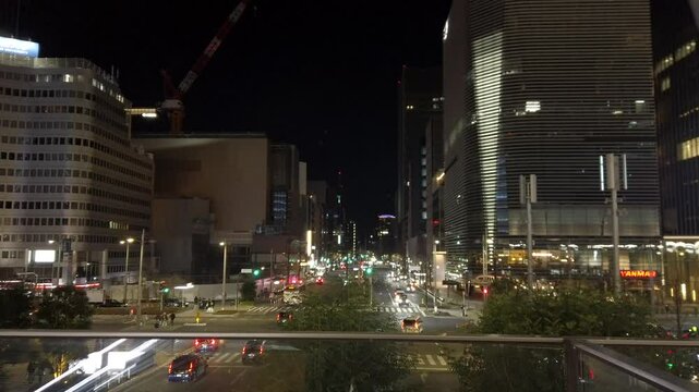 February 22, 2025. Chiyoda-ku, Tokyo, Japan.Traffic conditions at night in the direction of the Yaesu exit of Tokyo Station.