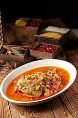 Spicy and sour soup with chopped peppers