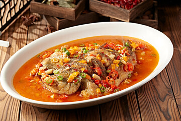 Spicy and sour soup with chopped peppers