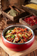 Braised pork intestines with black bean sauce, rice, pepper and celery
