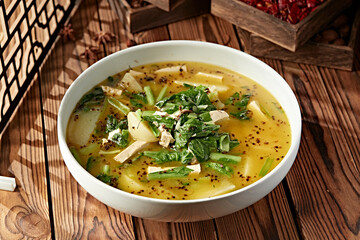 Potato, tofu and cabbage stew with sesame flowers