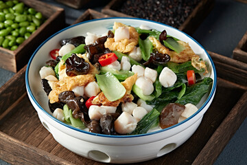 Fried black fungus, egg, Chinese cabbage and diced scallops