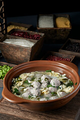 Stone pot coriander meatball egg soup