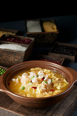 Healthy nourishing stone pot sour soup boiled fried egg wolfberry radish shrimp