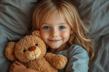 a cute little girl with blonde hair and blue eyes,