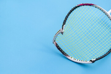 Badminton racket which is broken at the frame from playing by hittting and defending of the players.