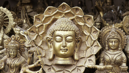 Closeup of statue of Buddha displayed in an antique shop