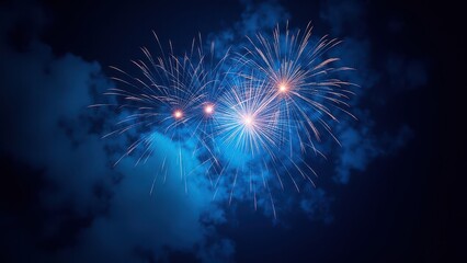 Blue fireworks light up the night sky with vibrant bursts and trails, creating a stunning display.