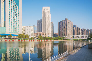 Obraz premium The urban architectural skyline, modern bridges, and Haihe River scenery of Tianjin, China on August 11, 2024