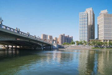 The urban architectural skyline, modern bridges, and Haihe River scenery of Tianjin, China on August 11, 2024