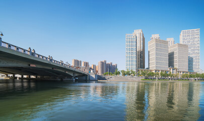 The urban architectural skyline, modern bridges, and Haihe River scenery of Tianjin, China on August 11, 2024