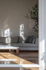 Fototapeta premium A modern living room with a gray sectional, a marble coffee table,.