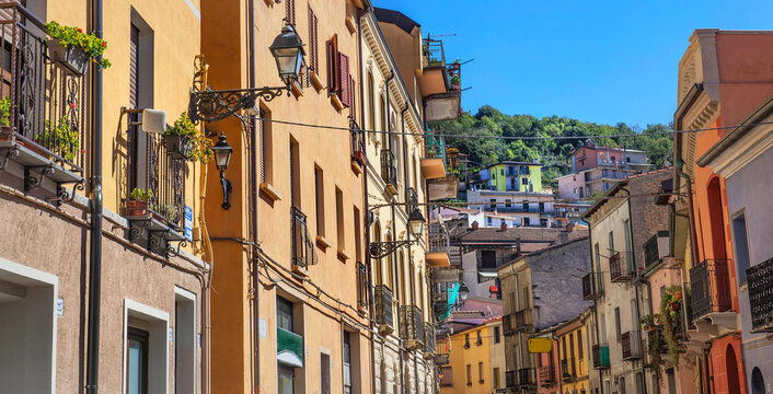 view on facades of colorful building in a typical Italian village in mountain - Seui sardaigne , italy