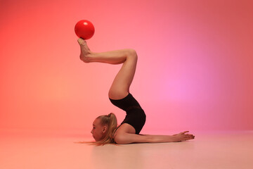 Rhythmic gymnastics girl. Colourful background.