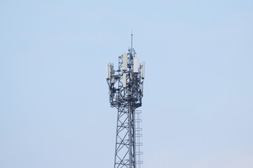 Telecommunication tower with blue sky background, communication and telecommunication concept