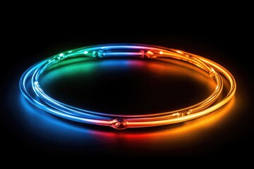 Colorful illuminated neon tubes arranged in a circular pattern against a dark background, showcasing vibrant hues