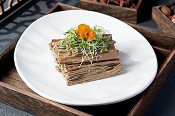 Delicious small bean sprouts mixed with black bean curd