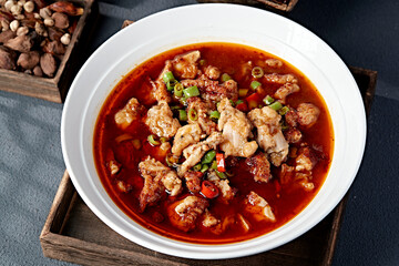 Hunan-style spicy bullfrog with red oil