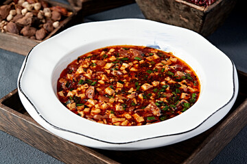 Local stir-fried spicy pork intestines, chives and tofu