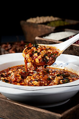 Local stir-fried spicy pork intestines, chives and tofu