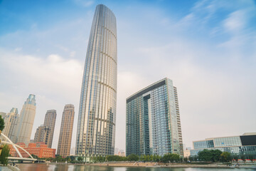 Obraz premium The urban architectural skyline, modern bridges, and Haihe River scenery of Tianjin, China on August 11, 2024