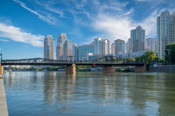 Fototapeta premium The urban architectural skyline, modern bridges, and Haihe River scenery of Tianjin, China on August 11, 2024