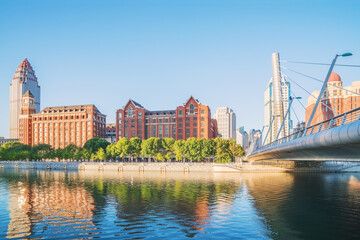 Fototapeta premium The urban architectural skyline, modern bridges, and Haihe River scenery of Tianjin, China on August 11, 2024