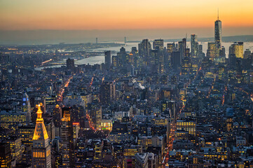 Obraz premium aerial view Manhattan district in New York , Sunset late afternoon, international landmark tourism in America, skyscrapers architecture
