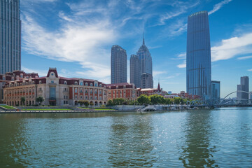 Obraz premium The urban architectural skyline, modern bridges, and Haihe River scenery of Tianjin, China on August 11, 2024