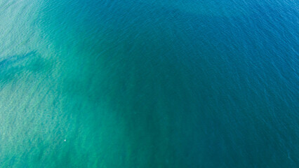 Aerial above blue ocean sea water calm relaxing 