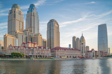 Obraz premium The urban architectural skyline, modern bridges, and Haihe River scenery of Tianjin, China on August 11, 2024