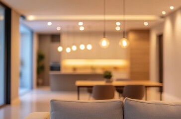 Fototapeta premium Cozy Modern Living Room with Soft Couch and Warm Lighting in a Stylish Home Interior Featuring a Contemporary Kitchen in the Background