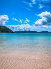 Fototapeta premium Tropical beach, calm water, island view, sunny sky, travel postcard