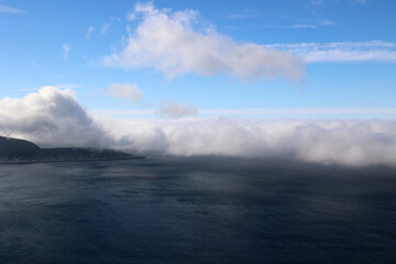 Fog coming from the sea towards the North Cape-Nordkapp, Norway     