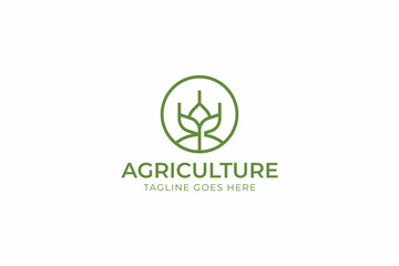 Modern and Creative Agriculture Logo Design Featuring a Green Plant Symbol