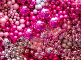 Christmas Texture or background of bright pink balls. Greeting or postcard