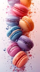 Colorful macarons falling with splashing colors
