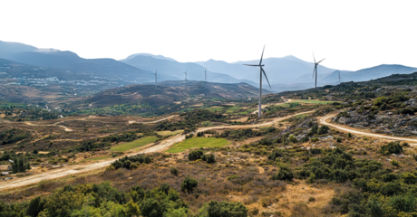 Scenic rural landscape with wind turbines on rolling hills, isolated on transparent cutout background