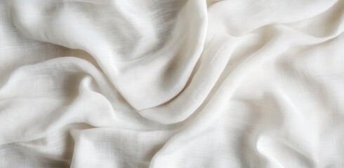 Fototapeta premium Elegant and Soft White Fabric Draped with Gentle Waves Highlighting the Subtle Texture and Lightness of the Material for Textile Design and Fashion Use