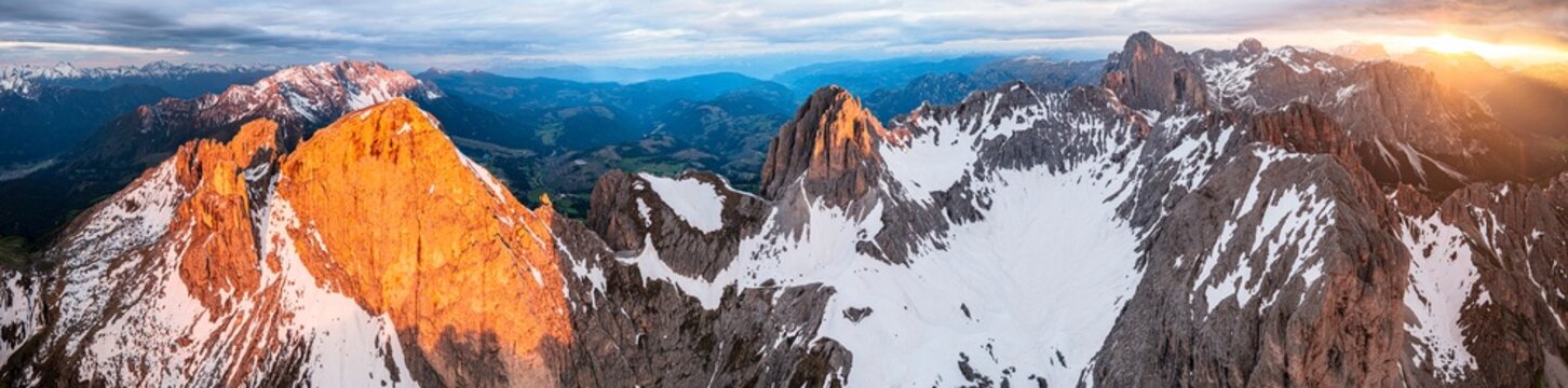 Aerial view of Latemar mountain at sunrise, Dolomites
