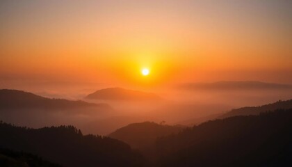 Fototapeta premium Misty Mountain Sunrise: A Breathtaking View