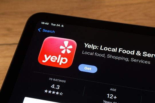 Apple app store with Yelp travel mobile application to be installed