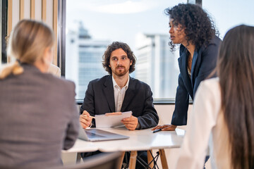 Group creative diverse business meeting discussing strategy startup project analysis finance process.Success business people work plan and brainstorm marketing idea with laptop in office.Teamwork