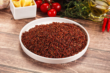 Red raw dry rice gor cooking